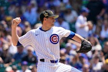 May 17, 2024; Chicago, Illinois, USA; Chicago Cubs pitcher Kyle Hendricks (28) throws the ball against the Pittsburgh Pirates during the first inning at Wrigley Field. Mandatory Credit: David Banks-USA TODAY Sports