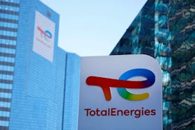 A logo of TotalEnergies is seen at an electric vehicle fuelling station in the La Defense business district in Courbevoie near Paris, France, February 8, 2023.