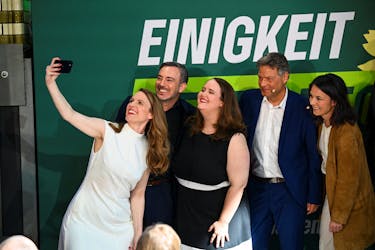 Germany's Greens party's candidate for the upcoming 2024 European elections Terry Reintke clicks a selfie with Greens party's candidate Sergey Lagodinsky, Greens party co-leader Ricarda Lang, Germany's Economy and Climate Minister Robert Habeck and Germany's Foreign Minister Annalena Baerbock during the Greens kick-off event of the campaign tour for the upcoming 2024 European elections, in Berlin, Germany May 13, 2024.