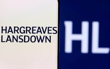 Hargreaves Lansdown logo is seen on a smartphone in front of displayed same logo in this illustration taken, December 1, 2021.