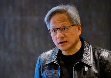 NVIDIA’s CEO Jensen Huang attends a media roundtable meeting in Singapore December 6, 2023.