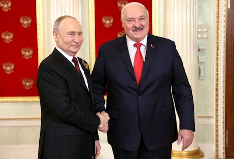 Russian President Vladimir Putin greets Belarusian President Alexander Lukashenko before a military parade on Victory Day, which marks the 79th anniversary of the victory over Nazi Germany in World War Two, in Moscow, Russia, May 9, 2024. Sputnik/Mikhail Metzel/Pool via