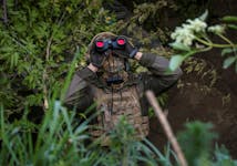 A Ukrainian serviceman from an air defence unit of the 93rd Mechanized Brigade monitors the sky at a frontline, amid Russia's attack on Ukraine, near the town of Bakhmut, Ukraine May 23, 2024.