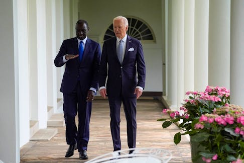 U.S. President Joe Biden and Kenya's President William Ruto walk along the Colonnade around the Rose Garden on their way to the Oval Office for a meeting after a State Arrival Ceremony at the White House, Thursday, May 23, 2024, in Washington, U.S.    Evan Vucci/Pool via REUTERS