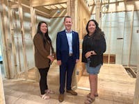 YACRO program directors Aimee Acker and Ginger Gates stand with Service Nova Scotia Minister Colton LeBlanc in an area of the YACRO Community Hub on Queen Street in Yarmouth that is undergoing renovations to make the washrooms accessible. TINA COMEAU