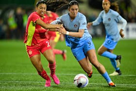 Apr 20, 2024; Portland, Oregon, USA; Houston Dash forward Diana Ordonez (9) and Portland Thorns FC defender Reyna Reyes (2) chase down the ball during the second half at Providence Park. Mandatory Credit: Troy Wayrynen-USA TODAY Sports/File Photo