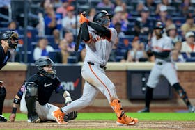 May 24, 2024; New York City, New York, USA; San Francisco Giants catcher Patrick Bailey (14) follows through on a grand slam home run during the eighth inning against the New York Mets at Citi Field. Mandatory Credit: Brad Penner-USA TODAY Sports