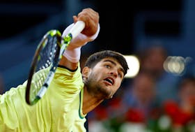 Tennis - Madrid Open - Park Manzanares, Madrid, Spain - May 1, 2024  Spain's Carlos Alcaraz in action during his quarter final match against Russia's Andrey Rublev