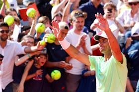 Tennis - French Open - Roland Garros, Paris, France - May 25, 2024 Spain's Rafael Nadal acknowledges fans during a practice session