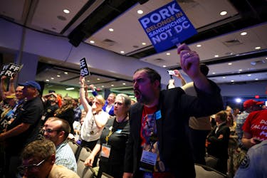 Supporters of Former U.S. President and Republican presidential candidate Donald Trump attend the Libertarian Party's national convention in Washington, D.C, U.S., May 25, 2024.