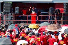 Julius Malema, leader of the South African opposition party the Economic Freedom Fighters (EFF), addresses the crowd during the Workers Day community meeting in Hammanskraal, Pretoria, South Africa, May 1, 2024.