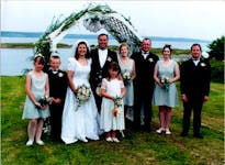 Shawn Taylor and his wedding party in 1996, featuring Derwin Clow on the far right, whose gift for the newlyweds was a whole bunch of beef.