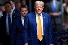 Former U.S. President Donald Trump walks to speak to the press at his trial for allegedly covering up hush money payments at Manhattan Criminal Court, New York, U.S. May 7, 2024. Win McNamee/Pool via
