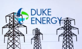 Electric power transmission pylon miniatures and Duke Energy logo are seen in this illustration taken, December 9, 2022.