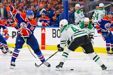 May 27, 2024; Edmonton, Alberta, CAN;   Edmonton Oilers forward Leon Draisaitl (29) tries to move the puck past Dallas Stars defensemen Miro Heiskanen (4)during the third period in game three of the Western Conference Final of the 2024 Stanley Cup Playoffs at Rogers Place. Mandatory Credit: Perry Nelson-USA TODAY Sports/File Photo