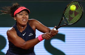 Tennis - French Open - Roland Garros, Paris, France - May 29, 2024 Japan's Naomi Osaka in action during her second round match against Poland's Iga Swiatek