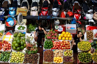 Vendors are seen at the Hom Market in Hanoi, Vietnam May 17, 2017.