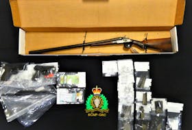 Codiac Regional RCMP officers recovered several firearms while executing searches at two Moncton apartments in connection with a drug trafficking investigation.