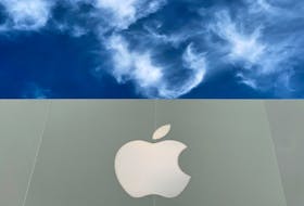 The Apple logo is shown atop an Apple store at a shopping mall in La Jolla, California, U.S., December 17, 2019, 2019.