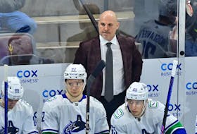 Apr 3, 2024; Tempe, Arizona, USA; against the Vancouver Canucks head coach Rick Tocchet looks on in the first period against the Arizona Coyotes at Mullett Arena. Mandatory Credit: Matt Kartozian-USA TODAY Sports/File Photo
