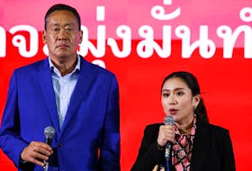 Srettha Thavisin, a local property tycoon and Pheu Thai Party's prime ministerial candidate and Paetongtarn Shinawatra, daughter of former Prime Minister Thaksin Shinawatra and Pheu Thai's prime ministerial candidate, speak to the media, after the polling stations closed, on the day of the general elections in Bangkok, Thailand, May 14, 2023.