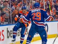Evander Kane (91) and Leon Draisaitl (29) of the Edmonton Oilers, celebrate a first period goal against the Los Angeles Kings at Rogers Place in Edmonton on May 1, 2024. 