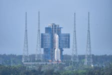 The Chang'e 6 lunar probe and the Long March-5 Y8 carrier rocket combination sit atop the launch pad at the Wenchang Space Launch Site in Hainan province, China April 27, 2024. cnsphoto via