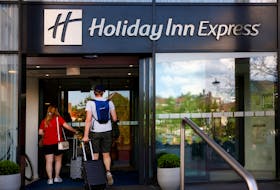 People enter the Holiday Inn Express hotel in Arnhem, Netherlands May 2, 2024.