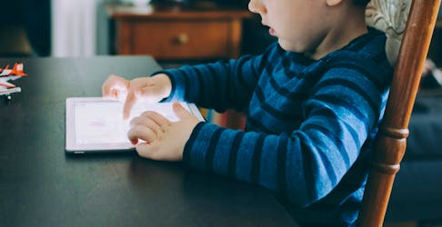 Research suggests all the time kids spend on screens and social media contributes to anxiety. - Unsplash