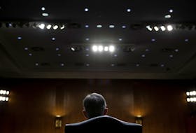 U.S. Federal Reserve Board Chairman Jerome Powell listens during his re-nominations hearing of the Senate Banking, Housing and Urban Affairs Committee on Capitol Hill,  in Washington, U.S., January 11, 2022. Brendan Smialowski/Pool via