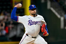 May 2, 2024; Arlington, Texas, USA; Texas Rangers starting pitcher Nathan Eovaldi (17) pitches against the Washington Nationals during the first inning at Globe Life Field. Mandatory Credit: Jerome Miron-USA TODAY Sports