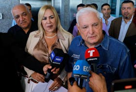 Panama's former President Ricardo Martinelli addresses the media, accompanied by his lawyer Shirley Castaneda, after filing a complaint with the General Secretariat of the National Assembly to investigate Panamanian President Laurentino Cortizo and Vice President, Jose Gabriel Carrizo, in Panama City, Panama, February 6, 2024.