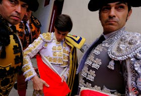 Novice bullfighter Marcos Linares prepares to take part in a bullfight with young bulls ("novillada"),  on the eve of the start of Sanfermines in Pamplona, Spain, July 5, 2023.