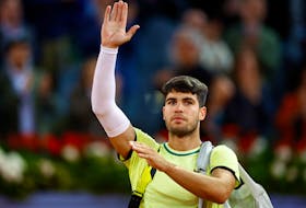Tennis - Madrid Open - Park Manzanares, Madrid, Spain - May 1, 2024  Spain's Carlos Alcaraz leaves court after his quarter final match against Russia's Andrey Rublev