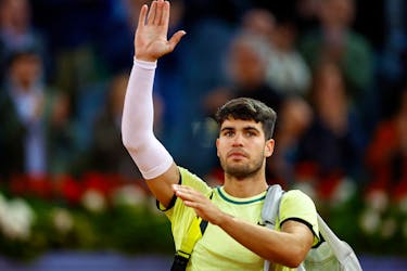 Tennis - Madrid Open - Park Manzanares, Madrid, Spain - May 1, 2024  Spain's Carlos Alcaraz leaves court after his quarter final match against Russia's Andrey Rublev