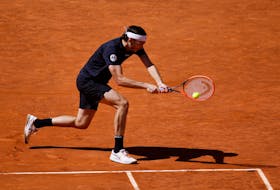 Tennis - Madrid Open - Park Manzanares, Madrid, Spain - May 3, 2024 Taylor Fritz of the U.S. in action during his semi final match against Russia's Andrey Rublev