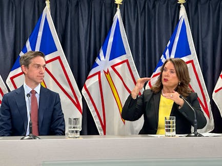 Attorney General John Hogan and Deputy Premier Siobhan Coady answer reporters' questions about the provincial government's constitutional challenge which will be filed in a Newfoundland and Labrador court in the coming weeks. -Juanita Mercer/The Telegram