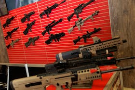 Guns are displayed at an exhibition booth, during the annual National Rifle Association (NRA) meeting in Dallas, Texas, U.S., May 19, 2024.