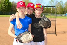 Kentville has its first all-girls’ baseball teams this summer. From left are Olivia Thomas, Zoe Zinck and Addisyn Garby, who play for the 14-and-under Wildcats.  
Jason Malloy