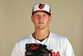 Feb 21, 2024; Sarasota, FL, USA; Baltimore Orioles starting pitcher Tyler Wells (68) poses for a photo during photo day at Ed Smith Stadium. Mandatory Credit: Kim Klement Neitzel-USA TODAY Sports/File Photo