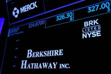Trading information and logo for Berkshire Hathaway is displayed on a screen on the floor of the New York Stock Exchange (NYSE) in New York City, U.S., May 10, 2023. 