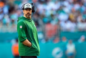 Dec 17, 2023; Miami Gardens, Florida, USA; New York Jets quarterback Aaron Rodgers (8) walks onto the field during an injury timeout in the first half against the Miami Dolphins at Hard Rock Stadium. Mandatory Credit: Jasen Vinlove-USA TODAY Sports/File Photo