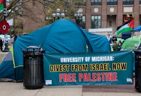 A coalition of University of Michigan students camp in the Diag to pressure the university to divest its endowment from companies that support Israel or could profit from the ongoing conflict between Israel and the Palestinian Islamist group Hamas, on the University of Michigan college campus in Ann Arbor, Michigan, U.S., April 23, 2024.
