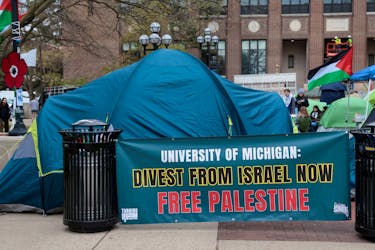 A coalition of University of Michigan students camp in the Diag to pressure the university to divest its endowment from companies that support Israel or could profit from the ongoing conflict between Israel and the Palestinian Islamist group Hamas, on the University of Michigan college campus in Ann Arbor, Michigan, U.S., April 23, 2024.