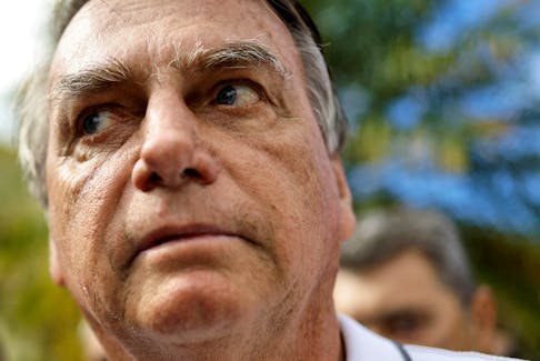 Former Brazilian President Jair Bolsonaro looks on as he arrives for a state meeting of the Liberal Party, in Goiania, Brazil, April 4, 2024.