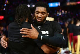 May 5, 2024; Cleveland, Ohio, USA; Cleveland Cavaliers guard Donovan Mitchell (45) hugs guard Darius Garland (10) during introductions before game seven of the game between the Cavaliers and the Orlando Magic of the first round for the 2024 NBA playoffs at Rocket Mortgage FieldHouse. Mandatory Credit: Ken Blaze-USA TODAY Sports