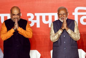 BJP President Amit Shah and Indian Prime Minister Narendra Modi gesture after the election results in New Delhi, India, May 23, 2019.