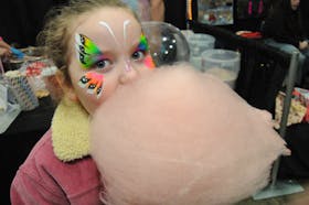 The 10th. annual Downhome Expo was held at the Mount Pearl Glacier this past weekend featuring just over 100 exhibitors with everything from A-Z for those seeking something to their liking. Among the exhibitors was the Newfoundland Pony Association. Above, Jesse Rees, 6, enjoys a feed of cotton candy at the Expo on Saturday afternoon, May 4, 2024. Jesse made the overseas trek across The Tickle onboard the ferry M/V Legionnaire from Bell Island with family members.
-Photo by Joe Gibbons/The Telegram