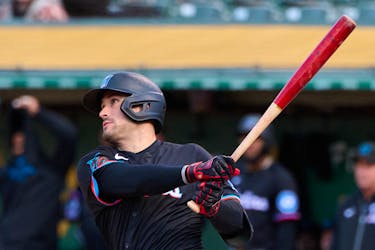 May 4, 2024; Oakland, California, USA; Miami Marlins catcher Nick Fortes (4) hits a one-run home run against the Oakland Athletics during the sixth inning at Oakland-Alameda County Coliseum. Mandatory Credit: Robert Edwards-USA TODAY Sports