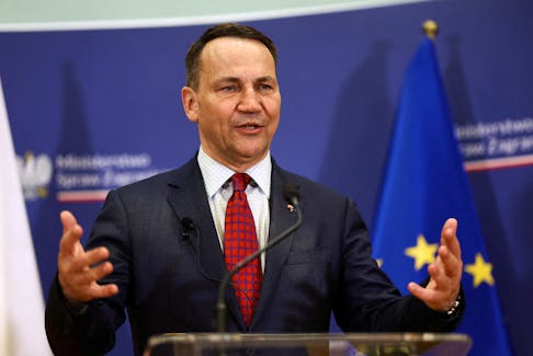 Polish Foreign Minister Radoslaw Sikorski speaks during a press conference with German Foreign Minister Annalena Baerbock, as part of celebrations to mark the 20th anniversary of Poland's accession to the European Union, in Slubice, Poland, May 1, 2024.
